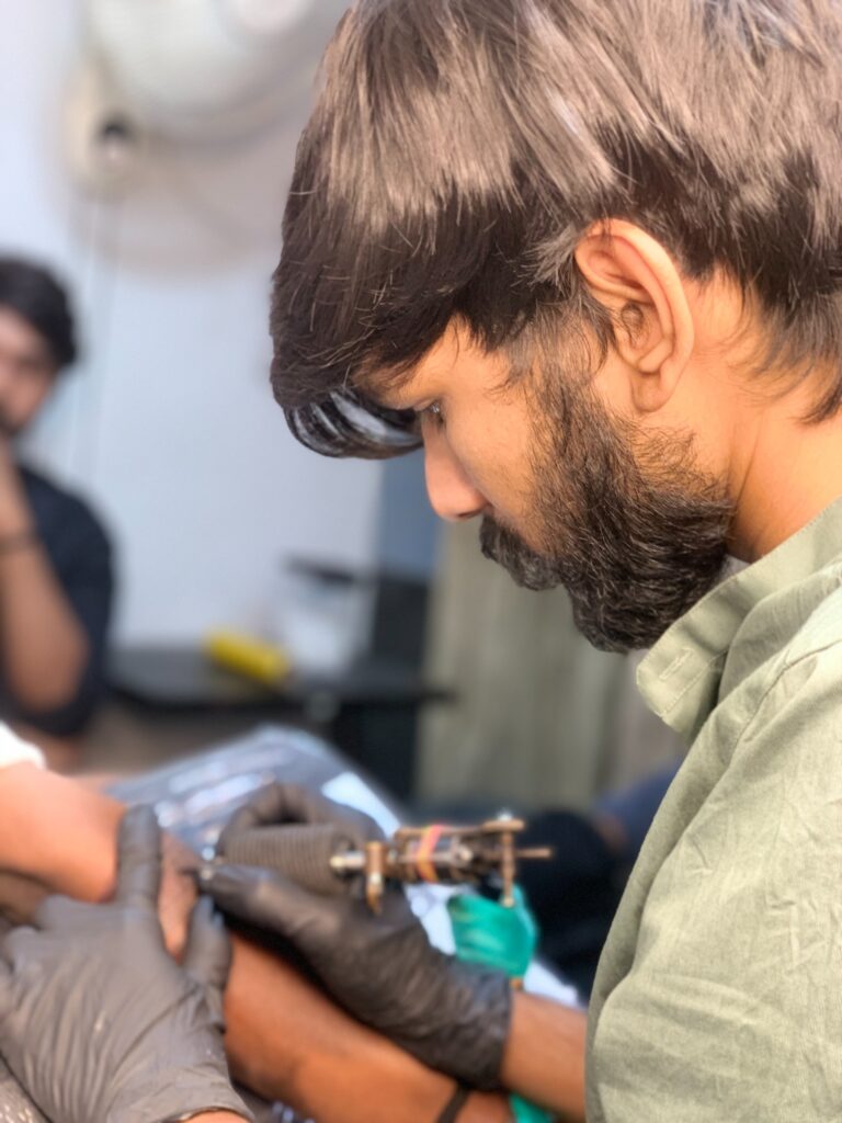 Portrait of Dipesh Vadher, professional tattoo artist at Electron Tattoos Gandhidham